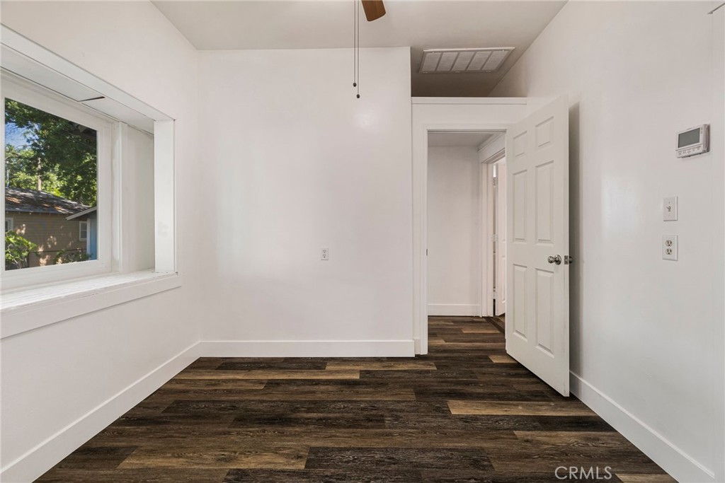 1617 Hemlock Street Chico, CA 95928 - Photo 20 of 60 a view of a room with wooden floor and window
