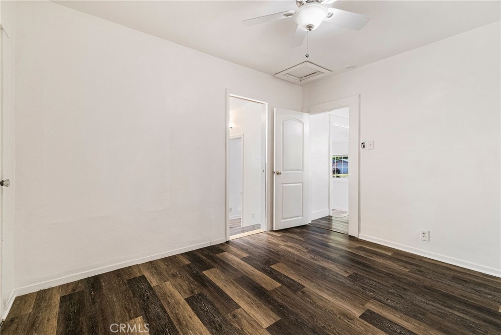 1617 Hemlock Street Chico, CA 95928 - Photo 25 of 60 a view of a room with wooden floor and a ceiling fan