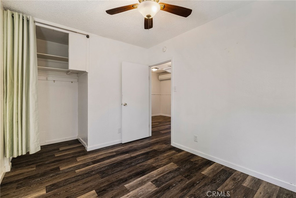 1617 Hemlock Street Chico, CA 95928 - Photo 42 of 60 a view of an empty room with wooden floor and a window