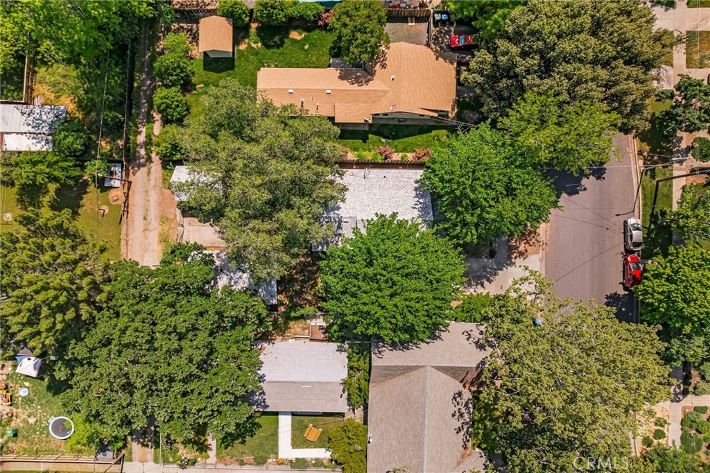 1617 Hemlock Street Chico, CA 95928 - Photo 52 of 60 an aerial view of residential house with outdoor space and trees all around