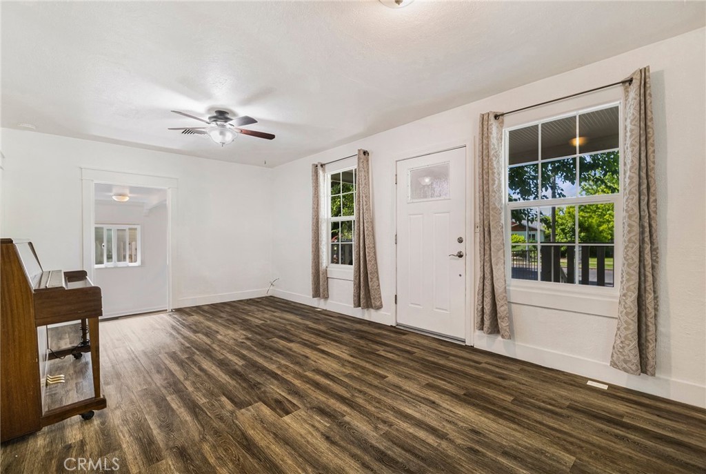 1617 Hemlock Street Chico, CA 95928 - Photo 7 of 60 a view of a livingroom with a ceiling fan and window