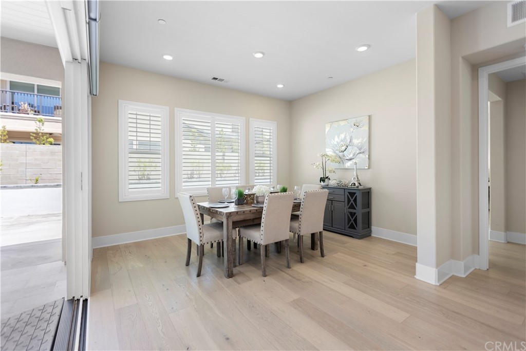 63 Crater Irvine, CA 92618 - Photo 12 of 34 a view of a dining room with furniture and chandelier