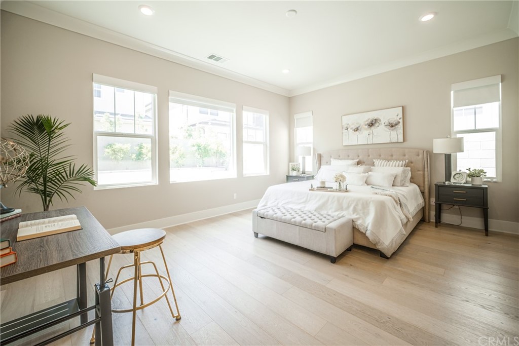 63 Crater Irvine, CA 92618 - Photo 18 of 34 a bedroom with a bed and a window