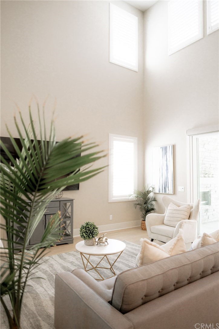 63 Crater Irvine, CA 92618 - Photo 30 of 34 a bedroom with a bed and a potted plant