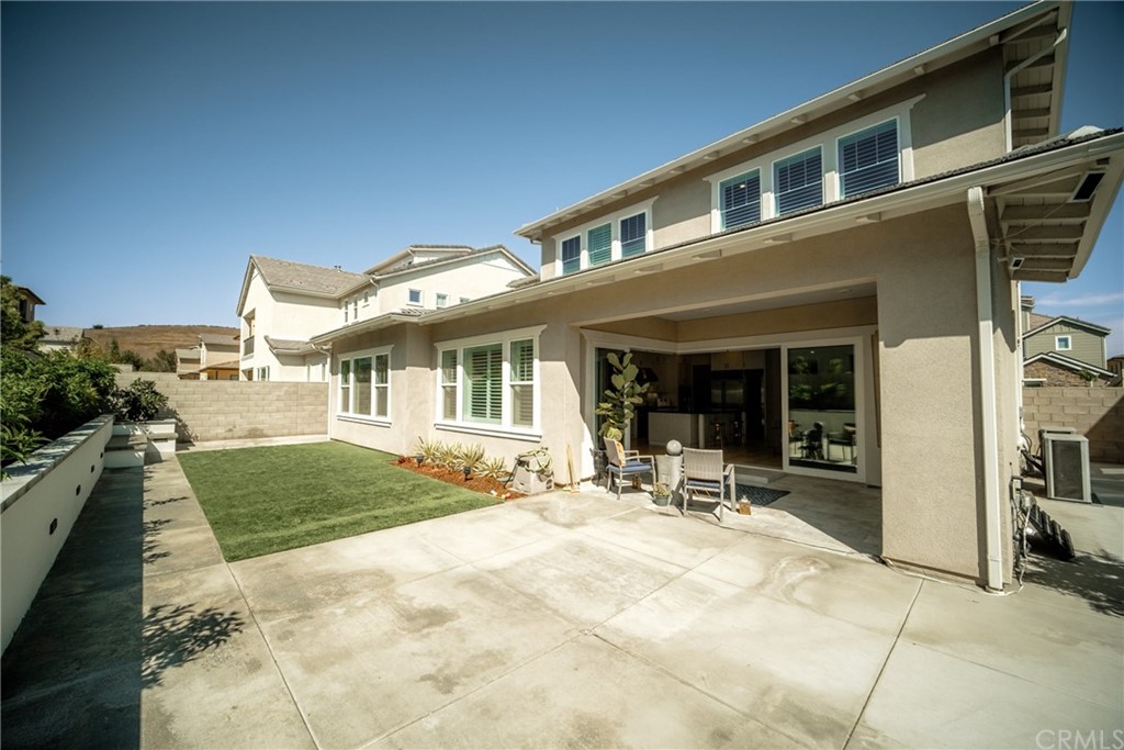 63 Crater Irvine, CA 92618 - Photo 34 of 34 a front view of a house with patio