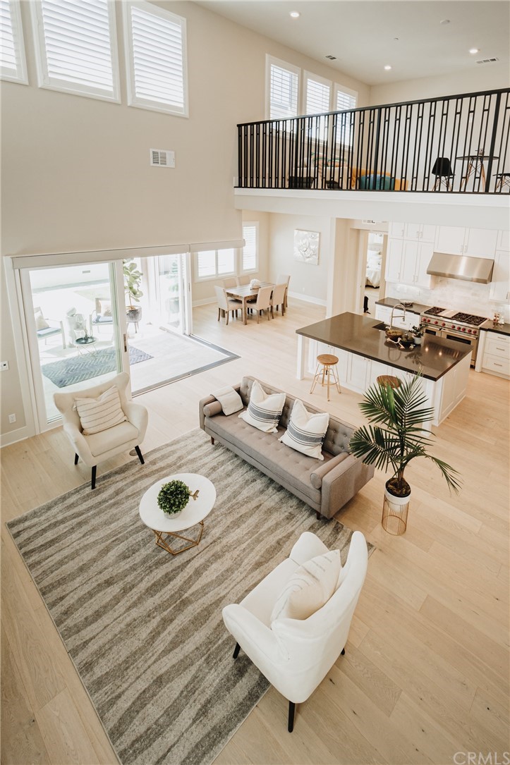 63 Crater Irvine, CA 92618 - Photo 7 of 34 a living room with furniture and a table