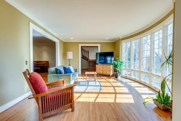 a living room with furniture and a table
