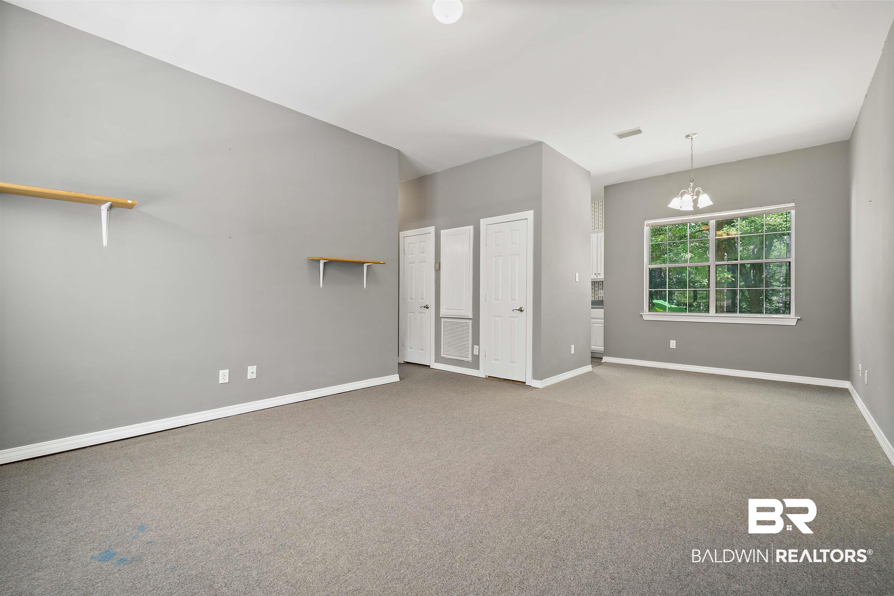 7280 Colonel Grierson Drive Daphne, AL 36527 - Photo 35 of 43 Guest Cottage Living and Dining Area