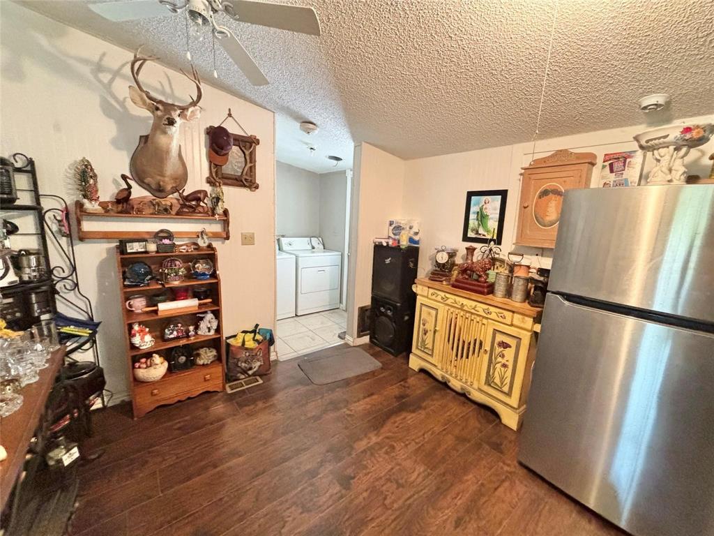119 Overlook Trail Azle, TX 76020 - Photo 13 of 20 a kitchen with stainless steel appliances a refrigerator a stove a sink and dishwasher