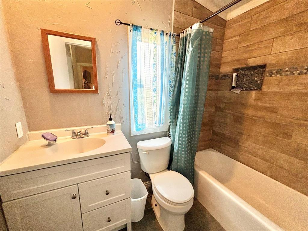 119 Overlook Trail Azle, TX 76020 - Photo 20 of 20 a bathroom with a sink a toilet and shower