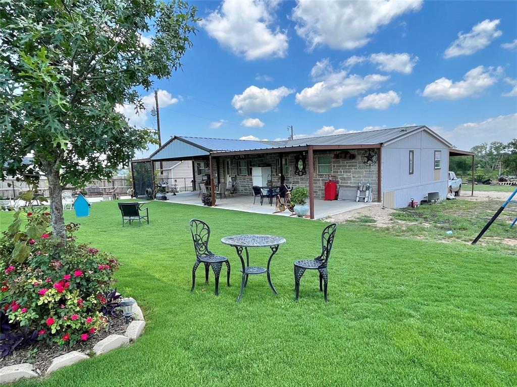 119 Overlook Trail Azle, TX 76020 - Photo 2 of 20 a view of an house with backyard and sitting area