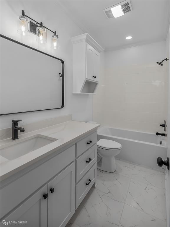231 Ramsey Road Stonewall, LA 71078 - Photo 27 of 39 a bathroom with a sink a toilet and vanity