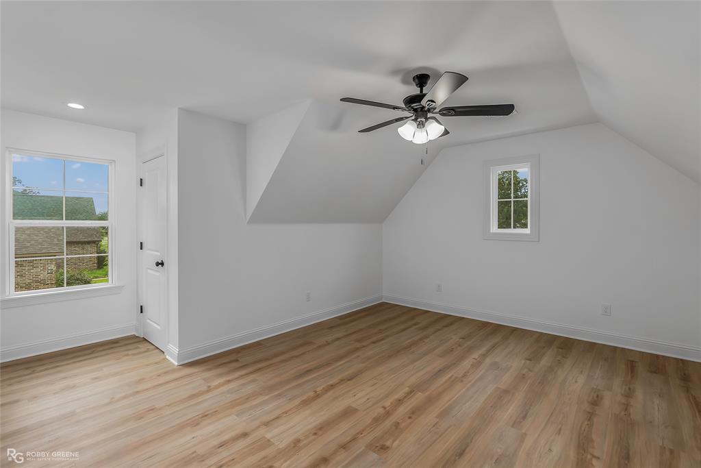 231 Ramsey Road Stonewall, LA 71078 - Photo 29 of 39 wooden floor in an empty room with a window