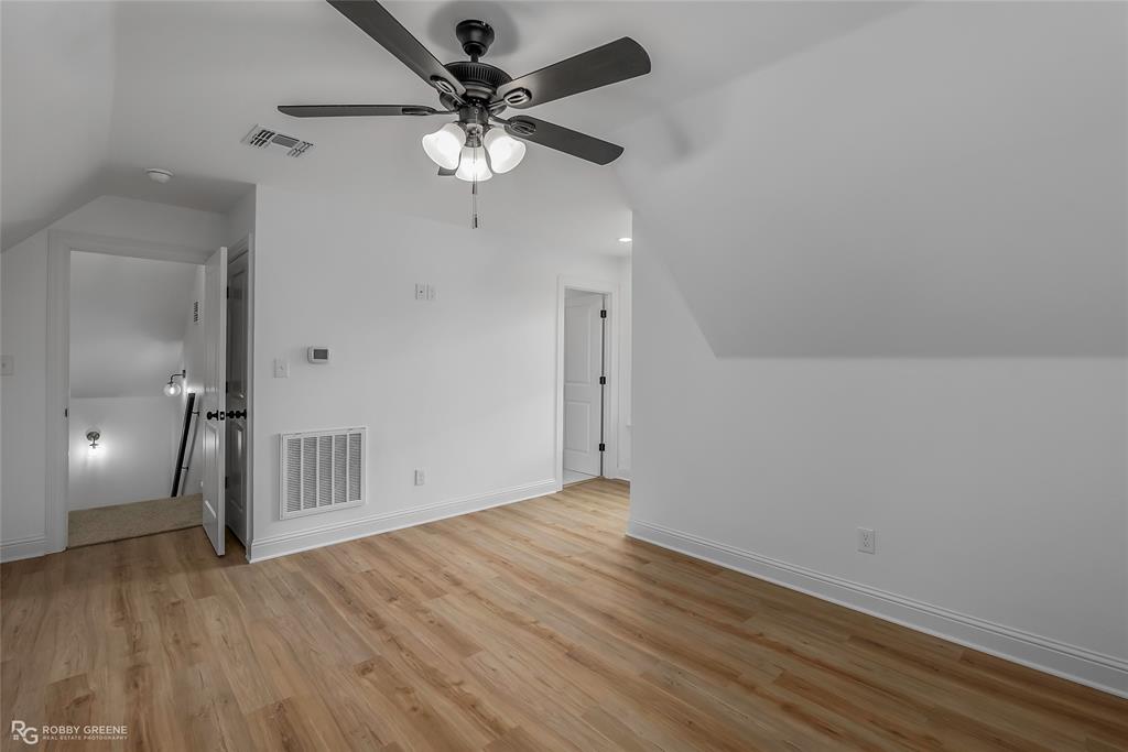 231 Ramsey Road Stonewall, LA 71078 - Photo 30 of 39 wooden floor in an empty room with a window