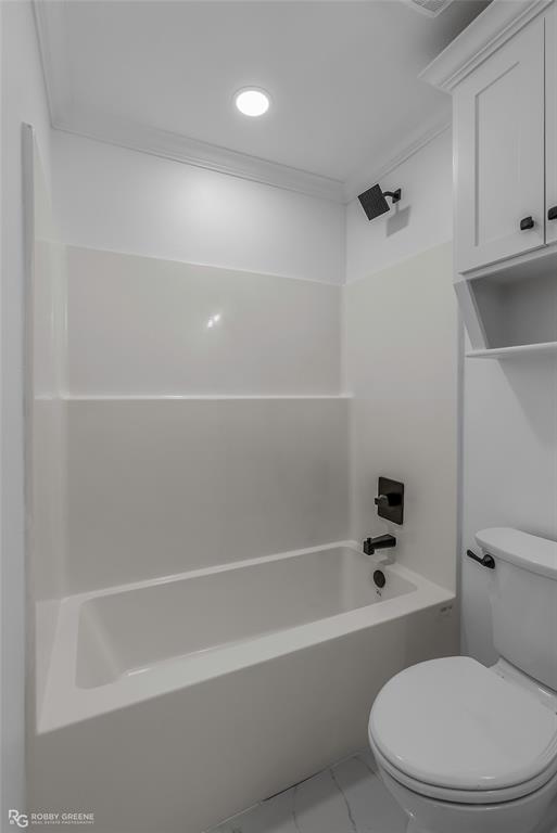 231 Ramsey Road Stonewall, LA 71078 - Photo 32 of 39 a white toilet and tub sitting next to a bathroom sink