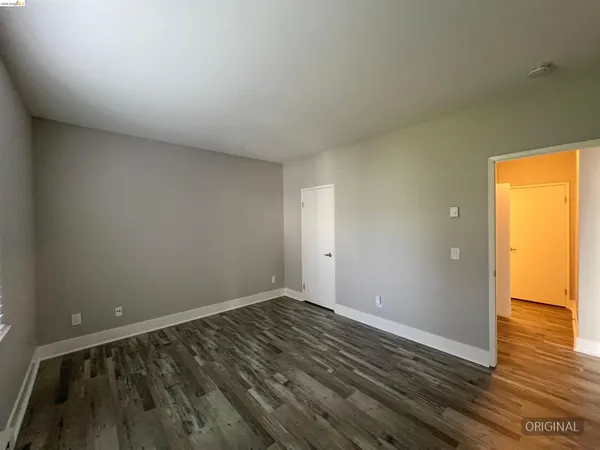 a view of an empty room and window