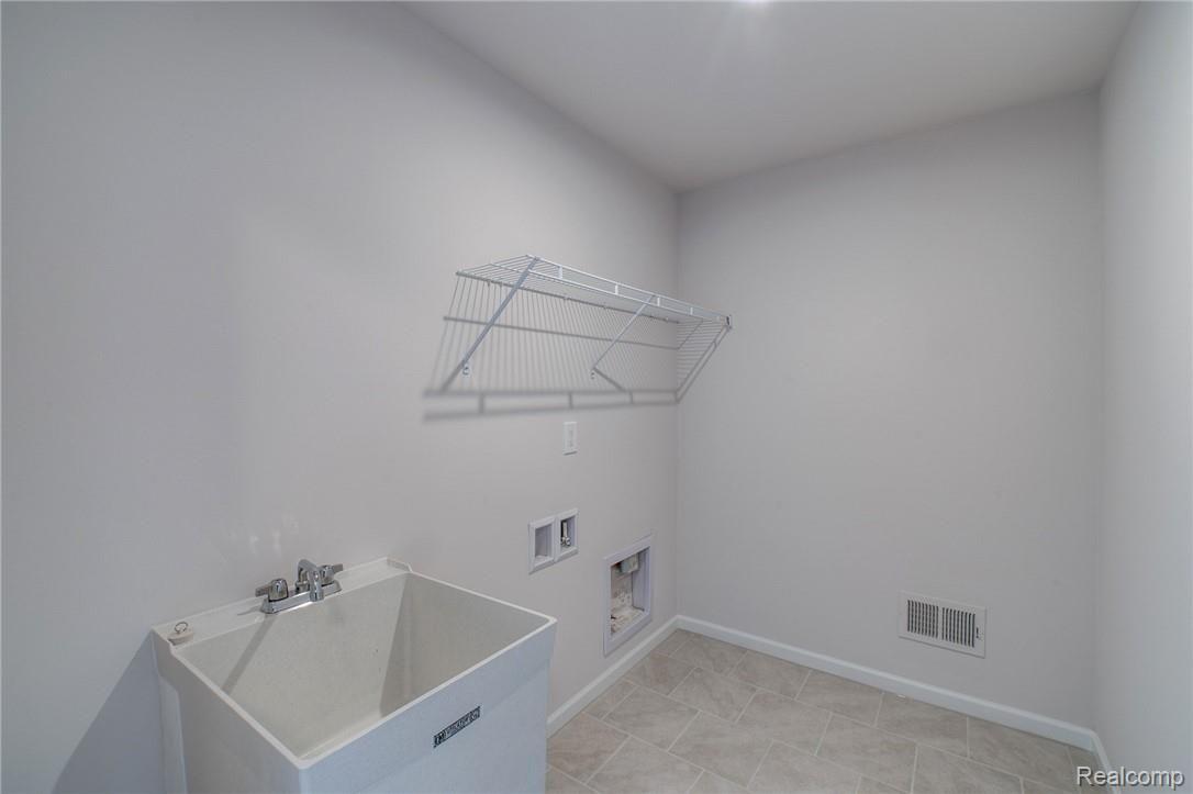 51056 Rockingham Drive Canton, MI 48188 - Photo 20 of 23 laundry.jpg