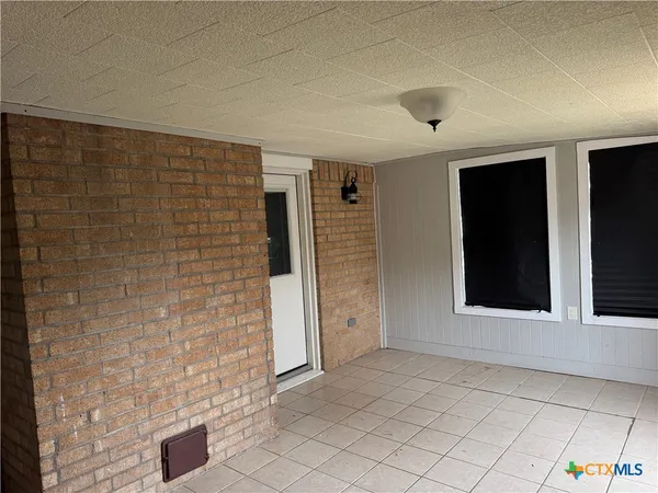 a house with yard in front of it