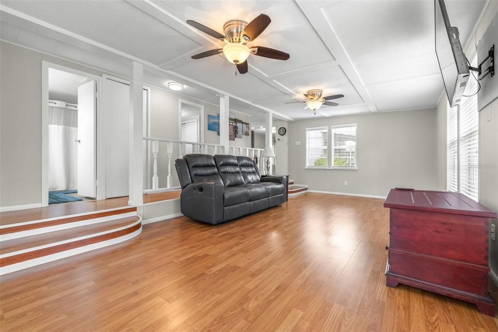 9936 East Perch Court Inverness, FL 34450 - Photo 12 of 30 a living room with furniture and a large window
