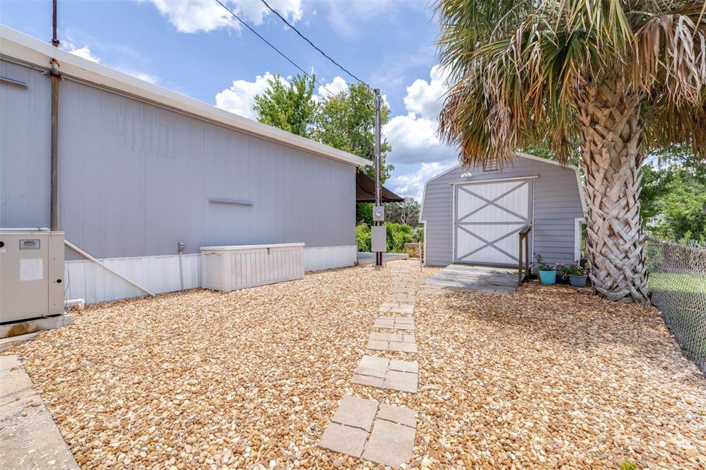 9936 East Perch Court Inverness, FL 34450 - Photo 21 of 30 a backyard of a house with lots of green space