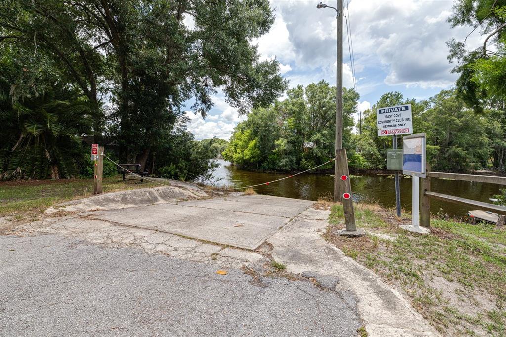 9936 East Perch Court Inverness, FL 34450 - Photo 22 of 30 a house with trees in front of it