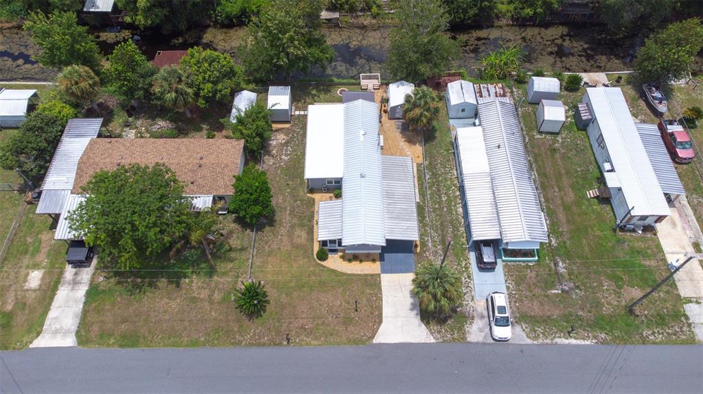 9936 East Perch Court Inverness, FL 34450 - Photo 26 of 30 an aerial view of residential houses with outdoor space