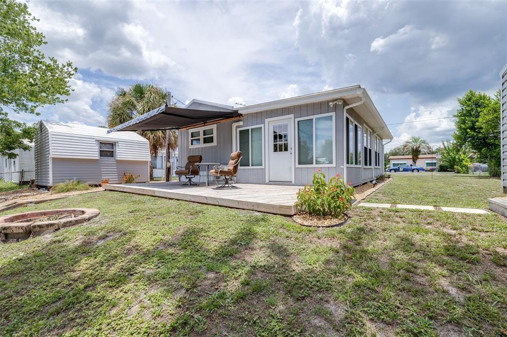 9936 East Perch Court Inverness, FL 34450 - Photo 3 of 30 a front view of a house with garden
