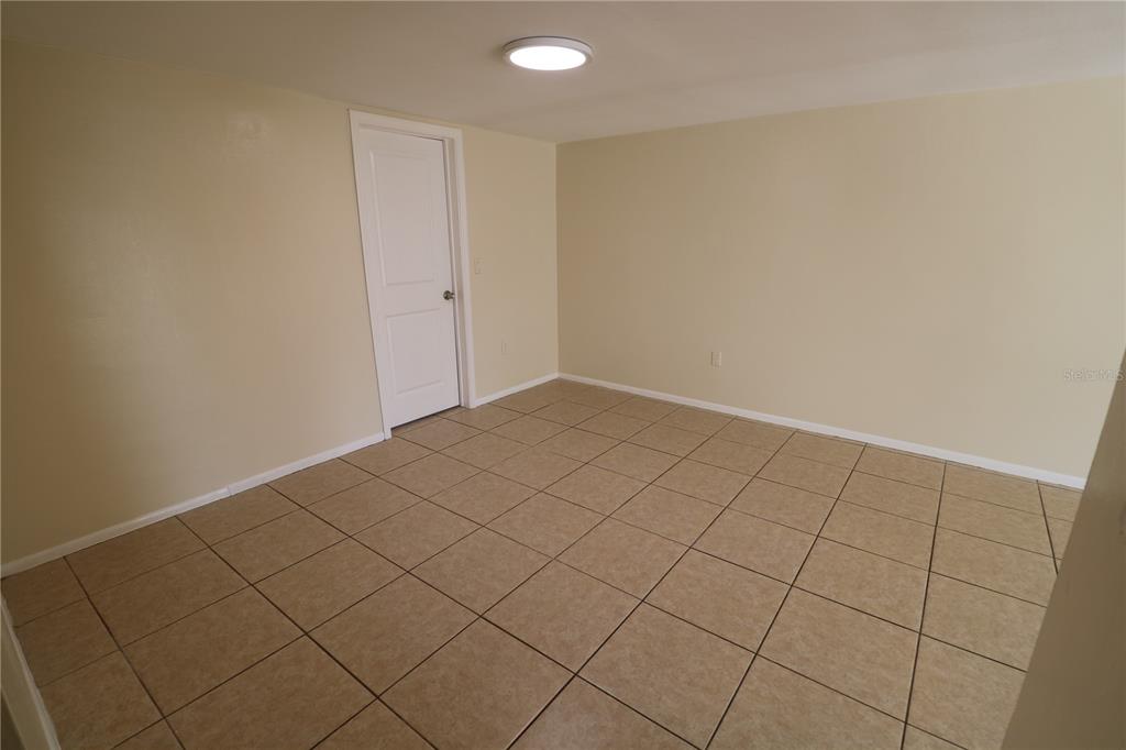 7825 Birchwood Drive Port Richey, FL 34668 - Photo 21 of 43 wooden floor in a room