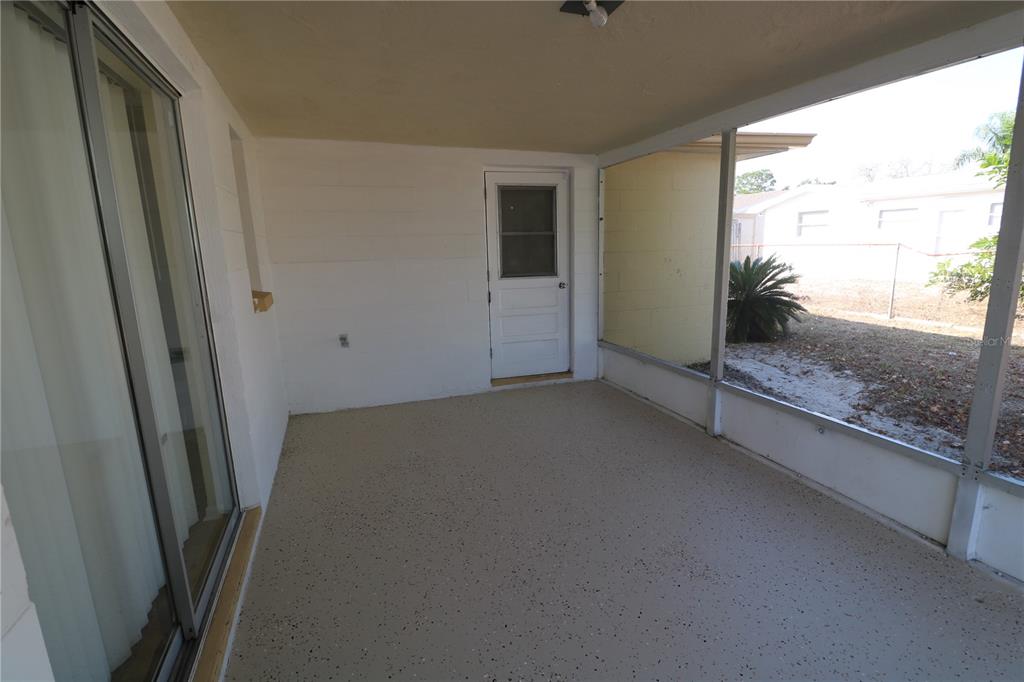 7825 Birchwood Drive Port Richey, FL 34668 - Photo 38 of 43 a view of a room with window