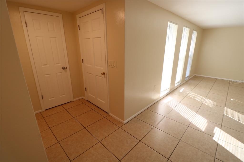 7825 Birchwood Drive Port Richey, FL 34668 - Photo 6 of 43 a view of a utility room with windows