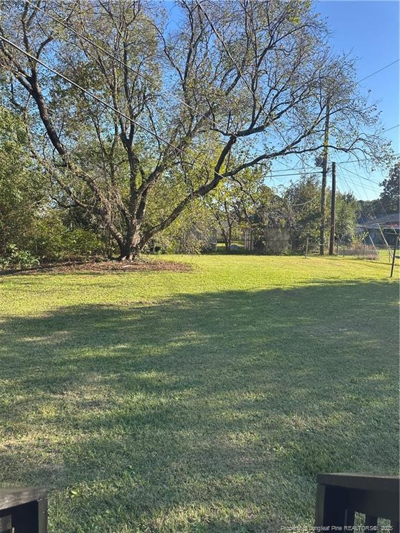 1224 East Manchester Road Spring Lake, NC 28390 - Photo 11 of 12 a view of an ocean from a yard