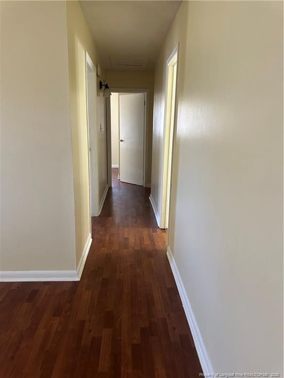 1224 East Manchester Road Spring Lake, NC 28390 - Photo 5 of 12 a view of a hallway with wooden floor