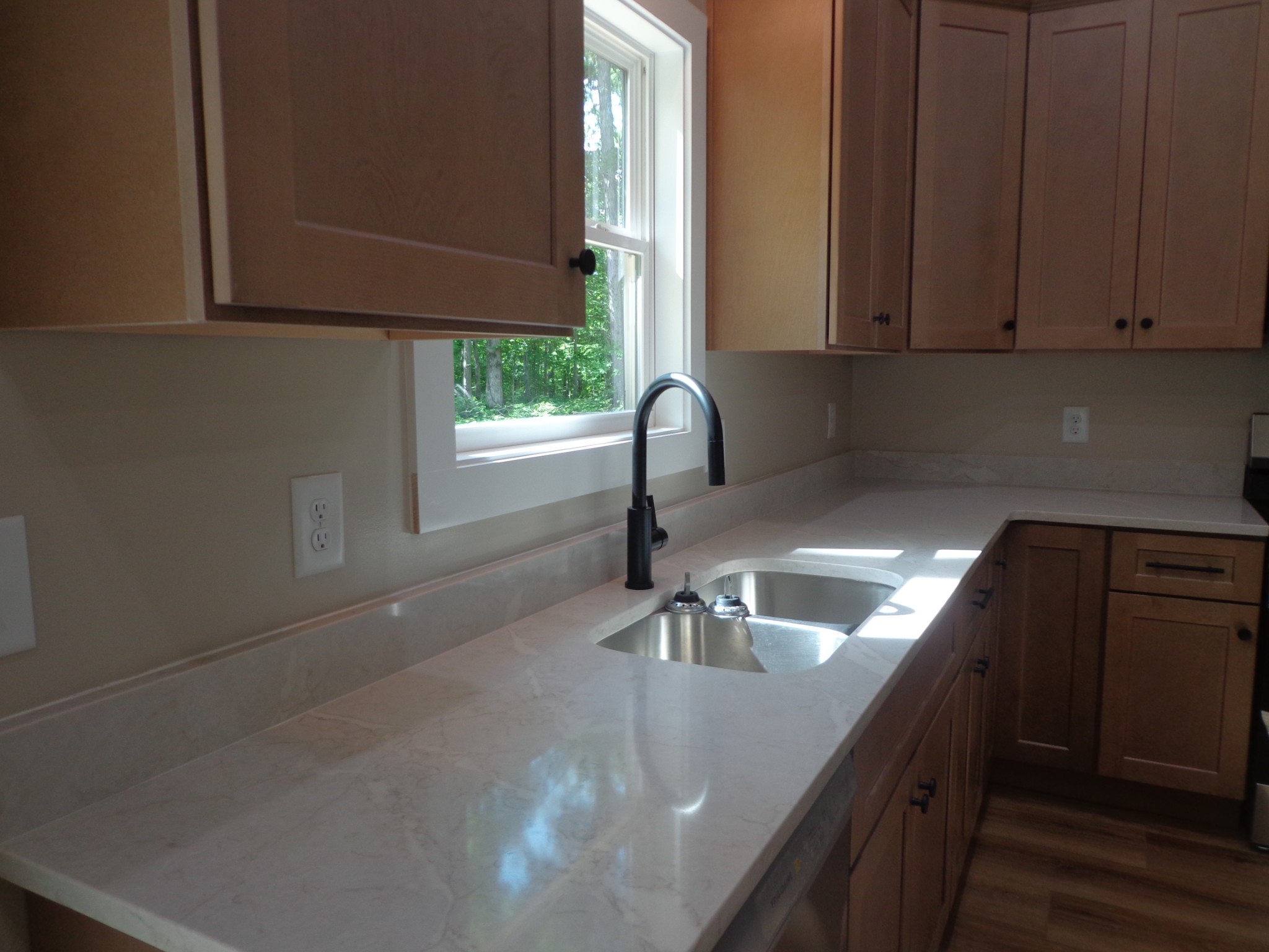 700 Hillcrest Road Waverly, TN 37185 - Photo 14 of 49 a kitchen with granite countertop a sink and cabinets