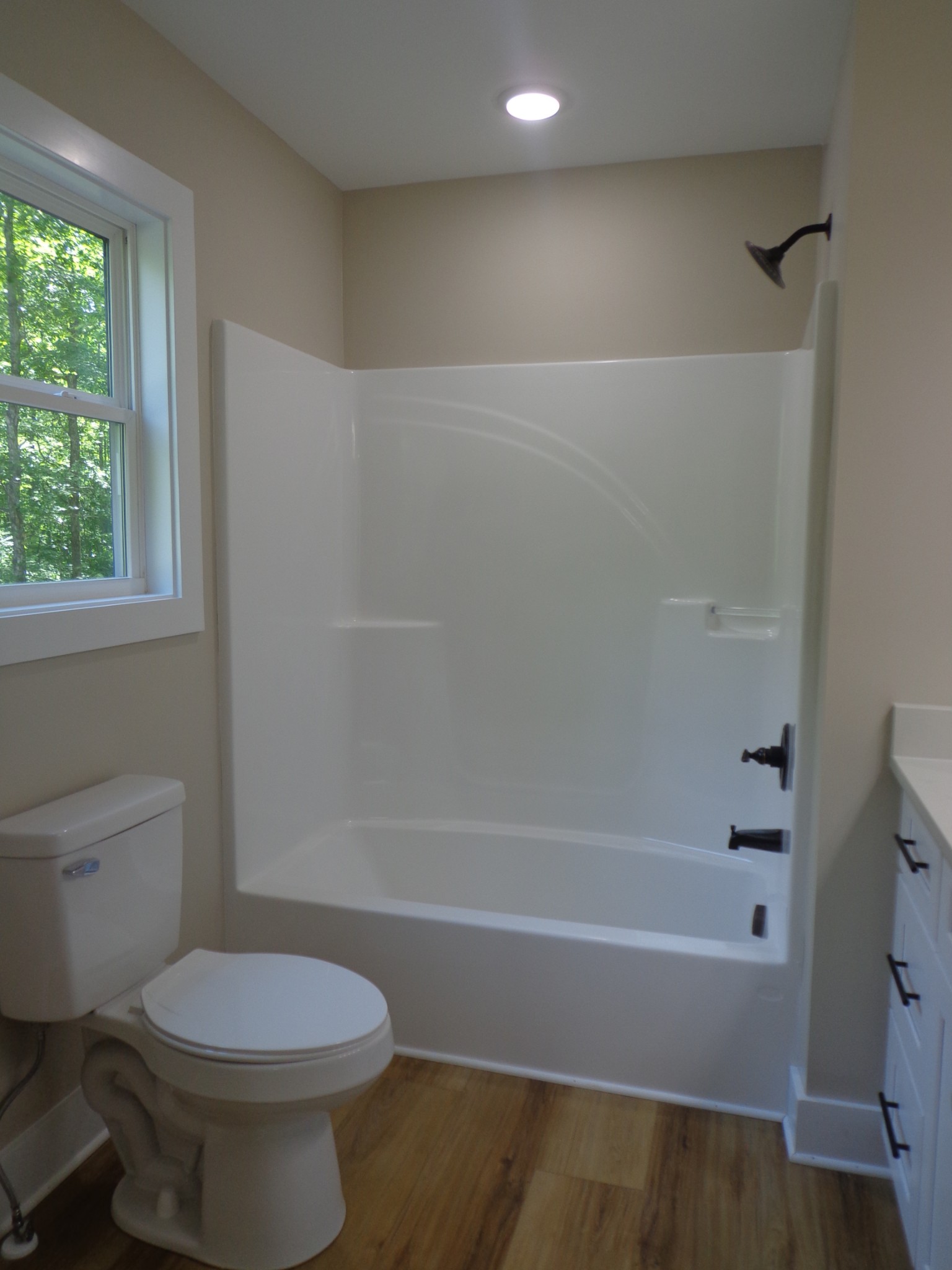 700 Hillcrest Road Waverly, TN 37185 - Photo 26 of 49 a bathroom with a toilet and a bathtub