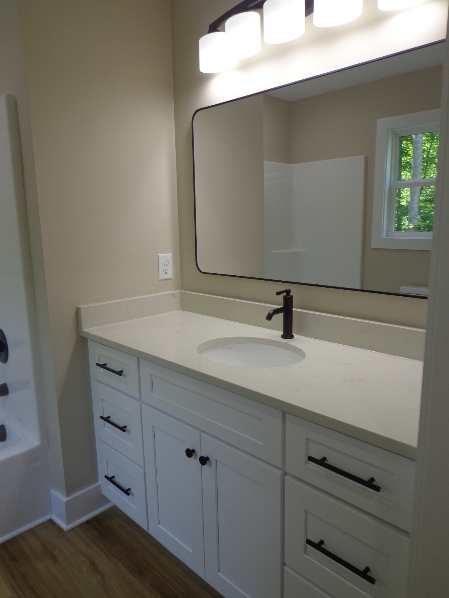 700 Hillcrest Road Waverly, TN 37185 - Photo 28 of 49 a bathroom with a sink and a mirror
