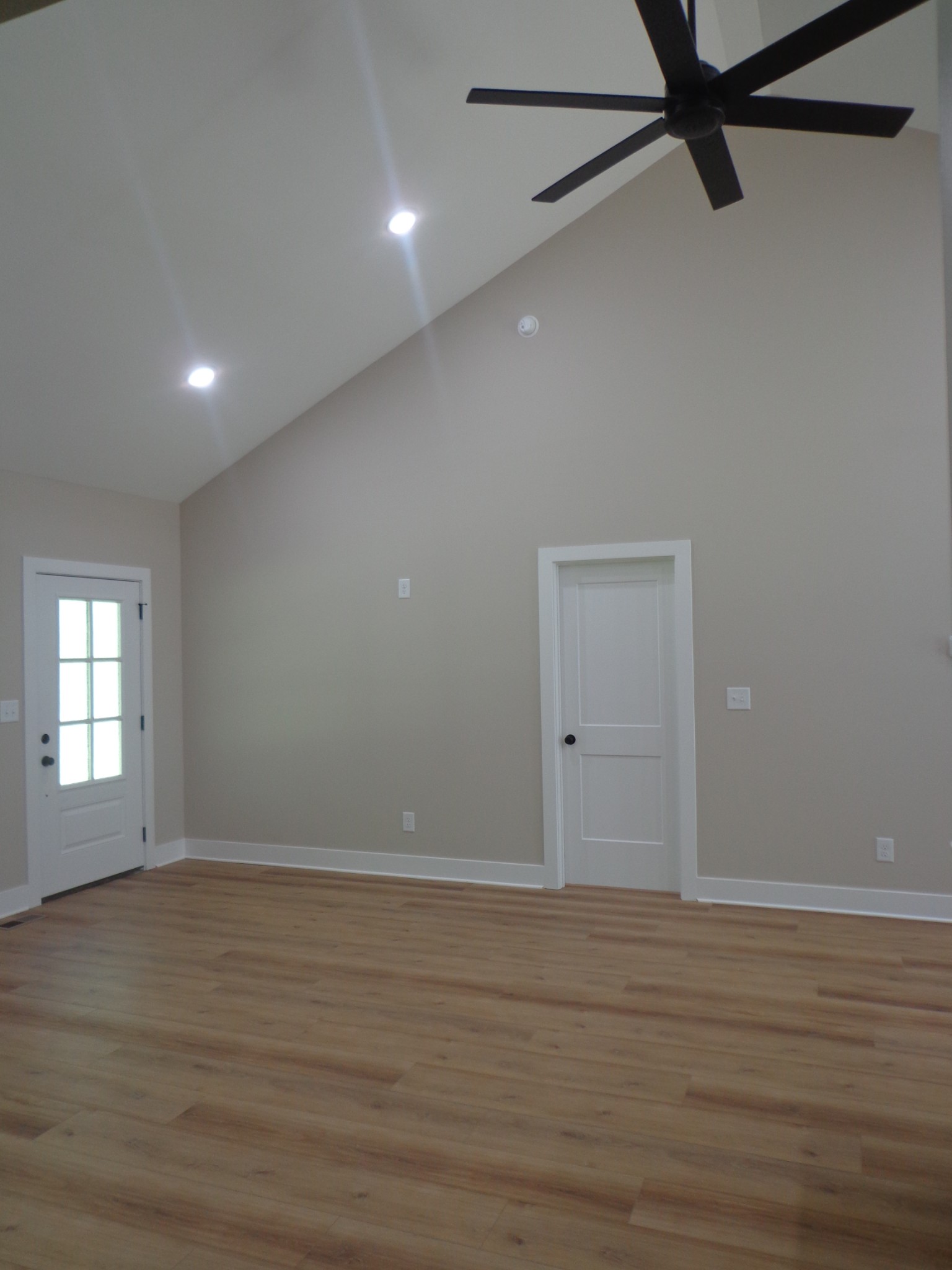 700 Hillcrest Road Waverly, TN 37185 - Photo 8 of 49 wooden floor in an empty room with a window