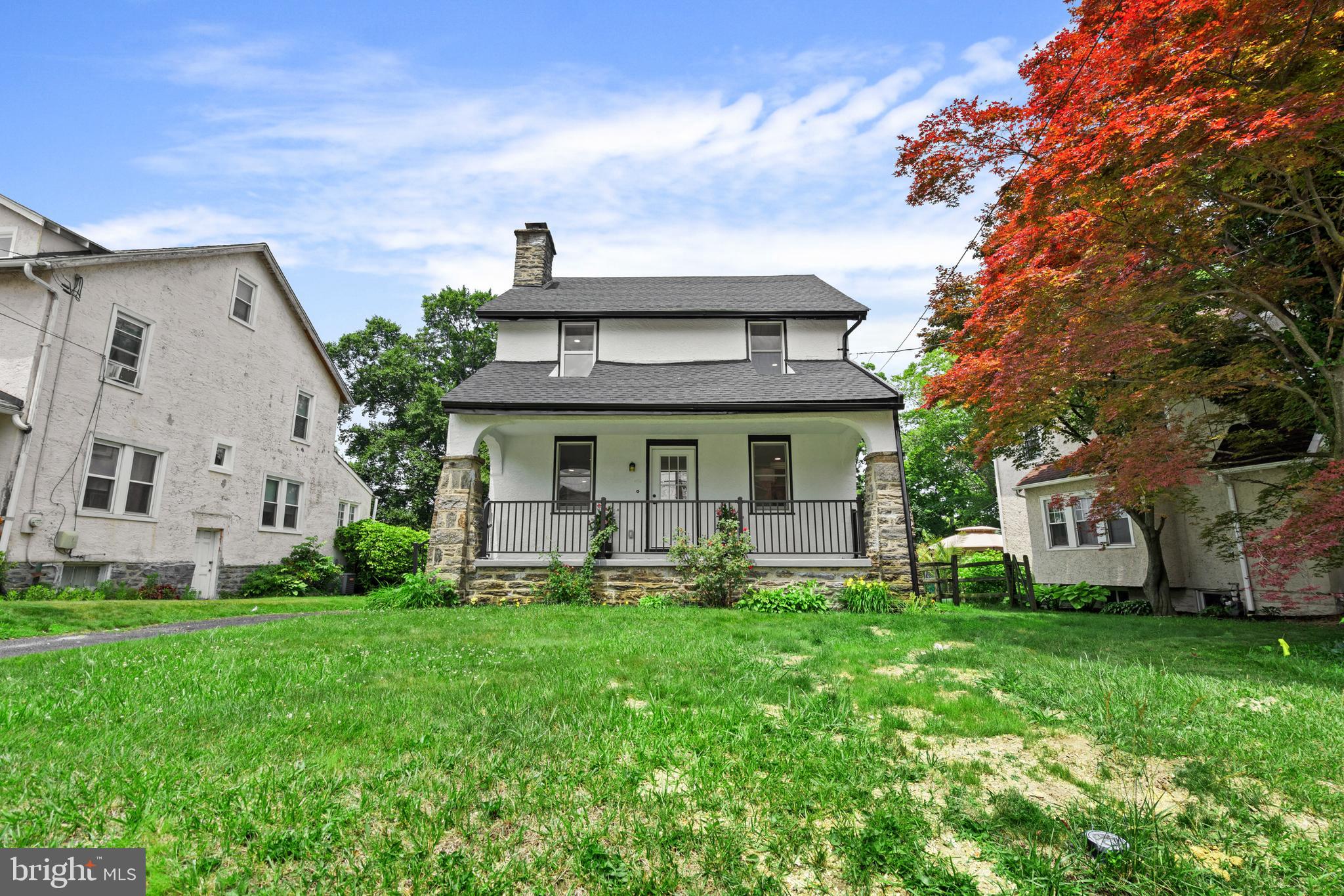 1082 Edge Hill Road Abington, PA 19001 - Photo 1 of 37 a front view of house with yard