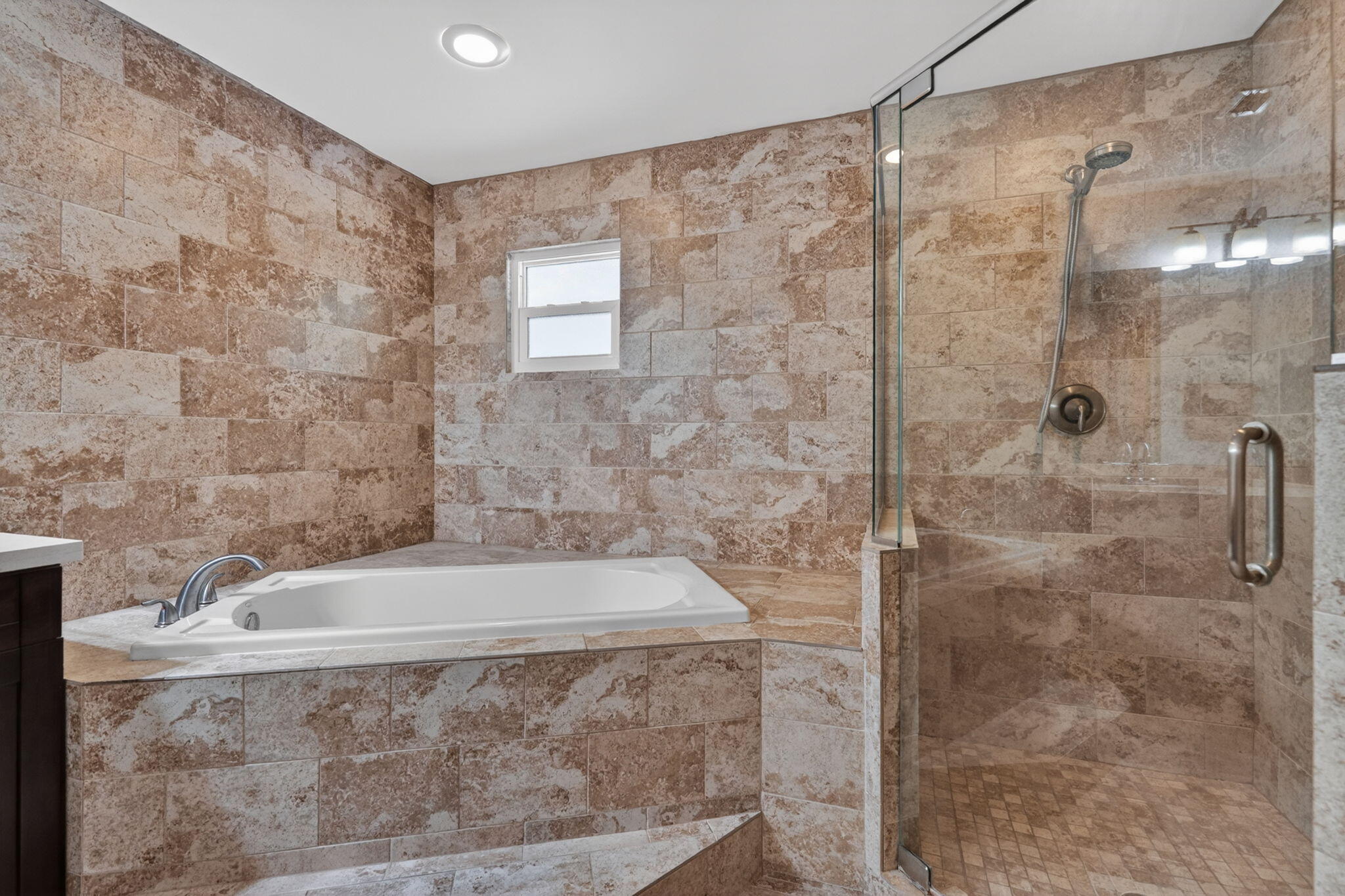 17391 Alexander Run Jupiter, FL 33478 - Photo 18 of 55 a bathroom with a shower