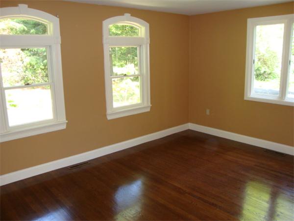 26 Old Road Weston, MA 02493 - Photo 11 of 23 a view of an empty room with wooden floor and a window