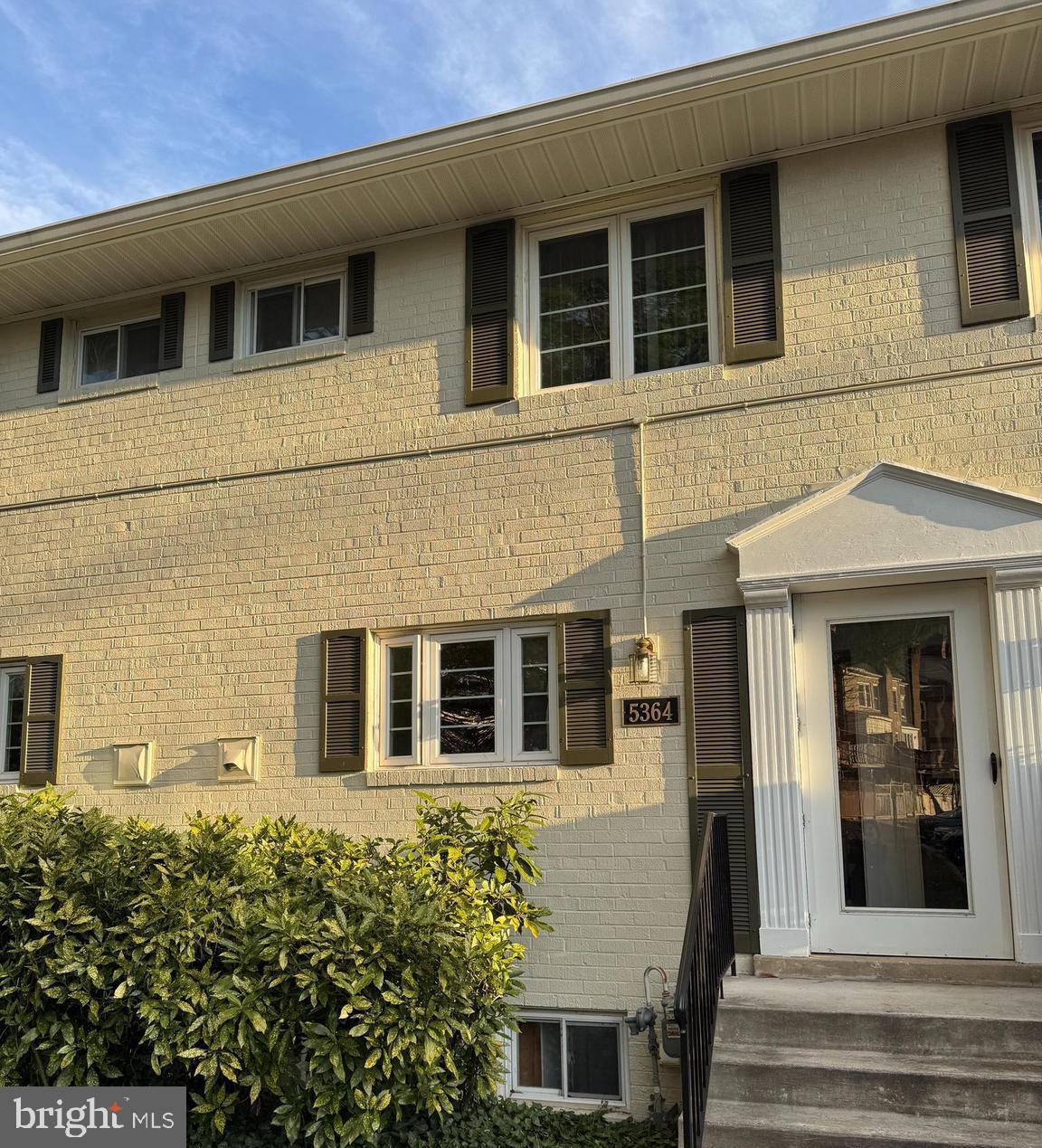 a view of a building with brick walls