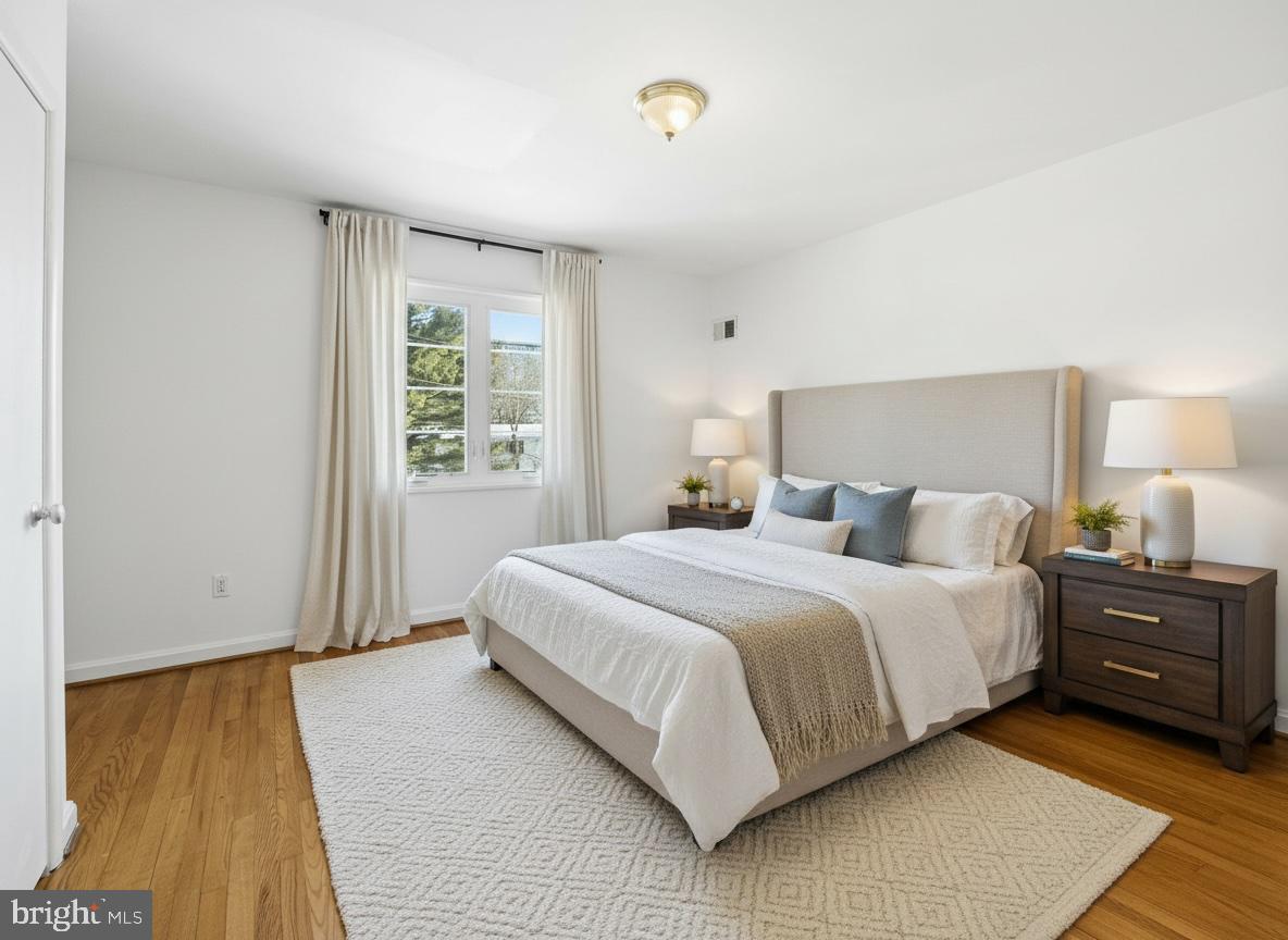 5364 Pooks Hill Road Bethesda, MD 20814 - Photo 11 of 25 a bedroom with a bed and a window