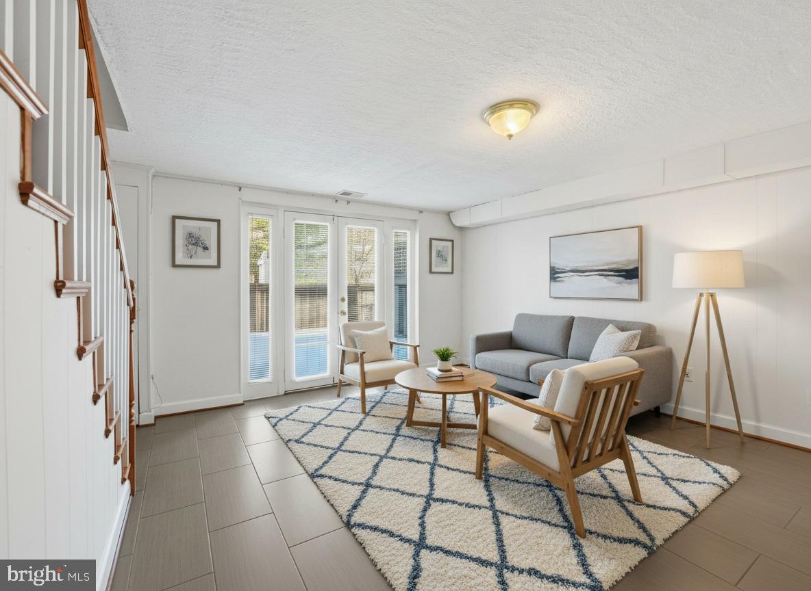 5364 Pooks Hill Road Bethesda, MD 20814 - Photo 18 of 25 a living room with furniture and a window