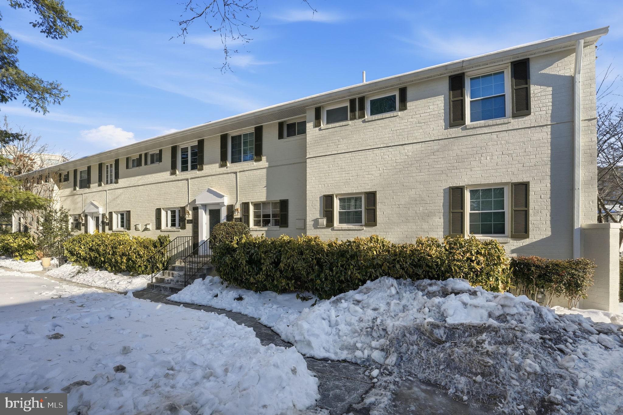 5364 Pooks Hill Road Bethesda, MD 20814 - Photo 25 of 25 a front view of a house with a yard