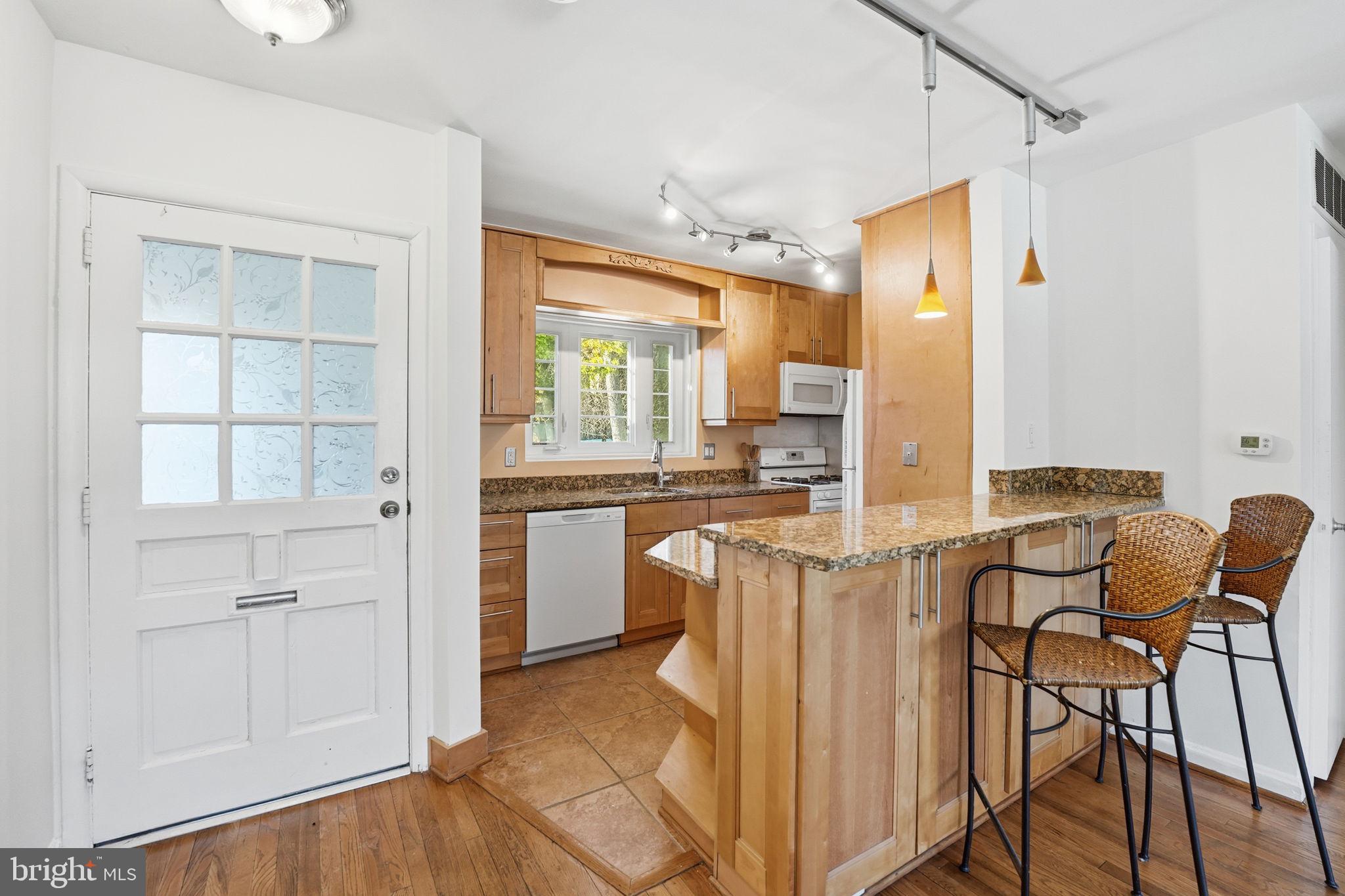 5364 Pooks Hill Road Bethesda, MD 20814 - Photo 7 of 25 a view of a kitchen cabinets and a counter top space