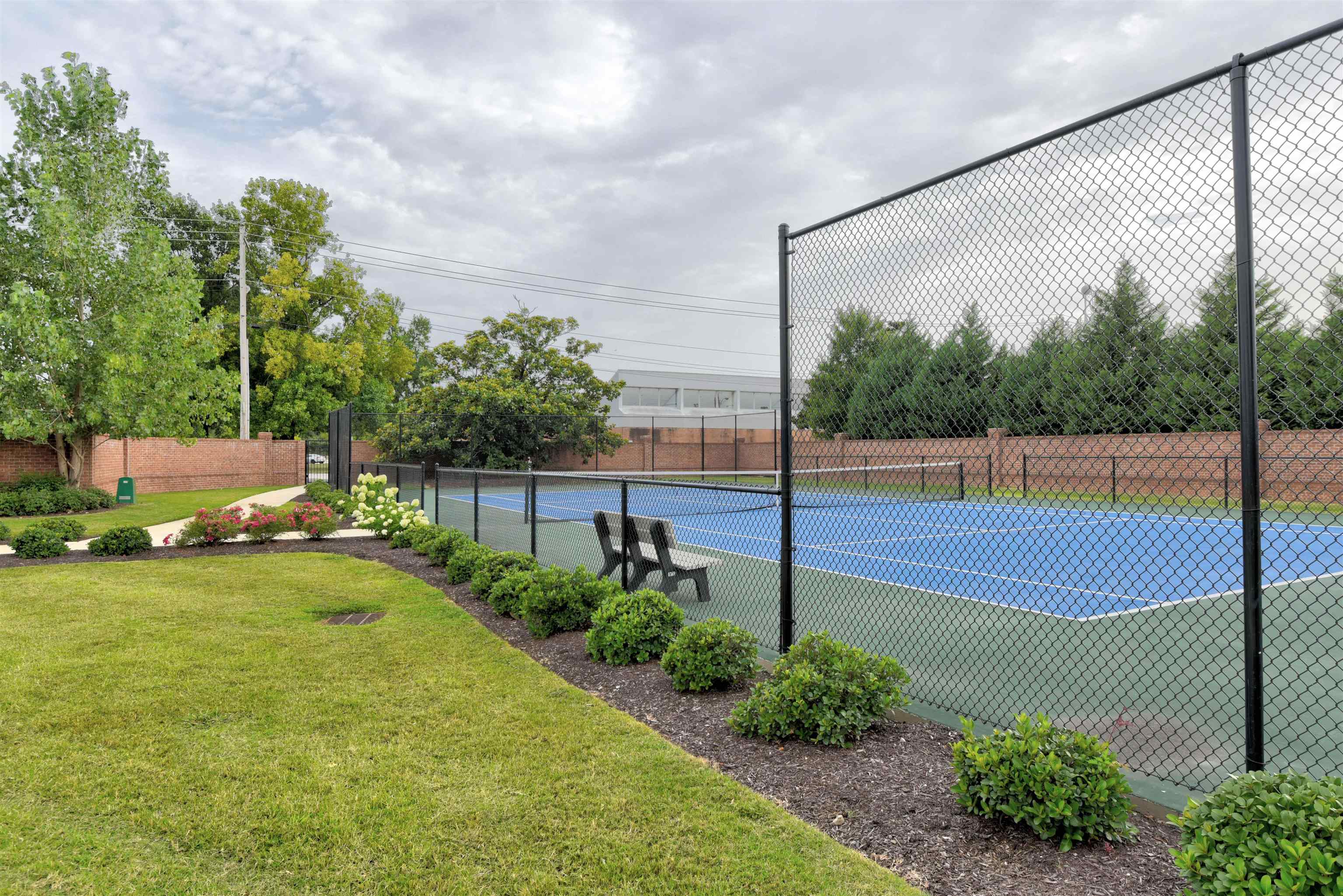 717 Riverside Drive, Unit 510 Memphis, TN 38103 - Photo 32 of 34 a view of a tennis court