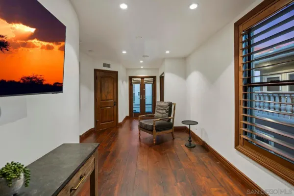 an empty room with lots of white walls