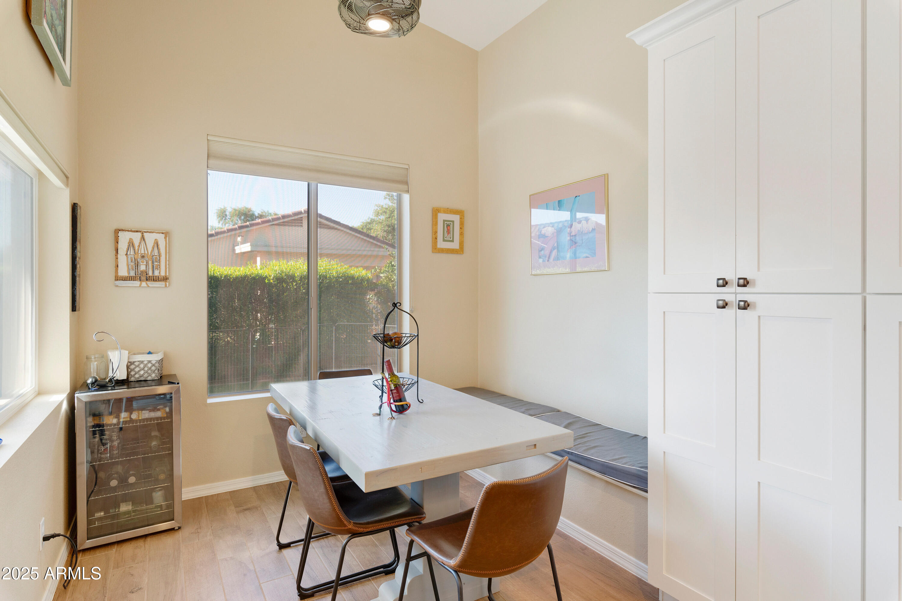 4727 East Azalea Drive Gilbert, AZ 85298 - Photo 13 of 46 a view of a dining room with a table and chairs