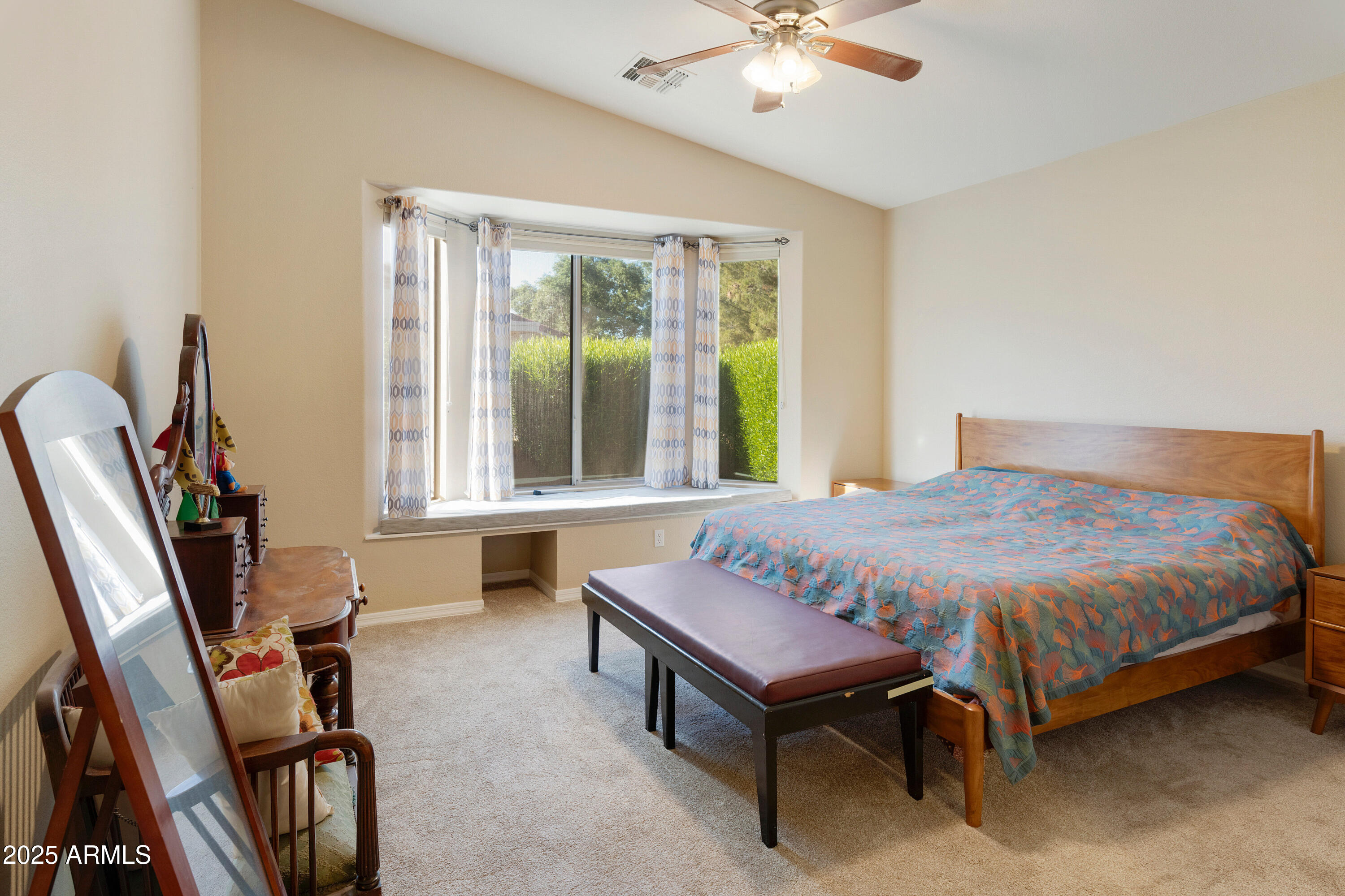 4727 East Azalea Drive Gilbert, AZ 85298 - Photo 15 of 46 a spacious bedroom with a bed and a large window