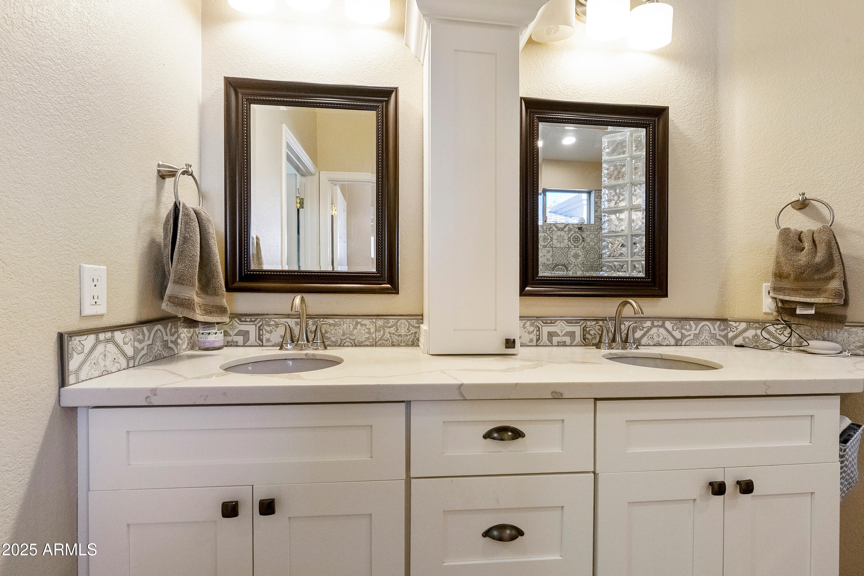 4727 East Azalea Drive Gilbert, AZ 85298 - Photo 17 of 46 a bathroom with a double vanity sink and mirror