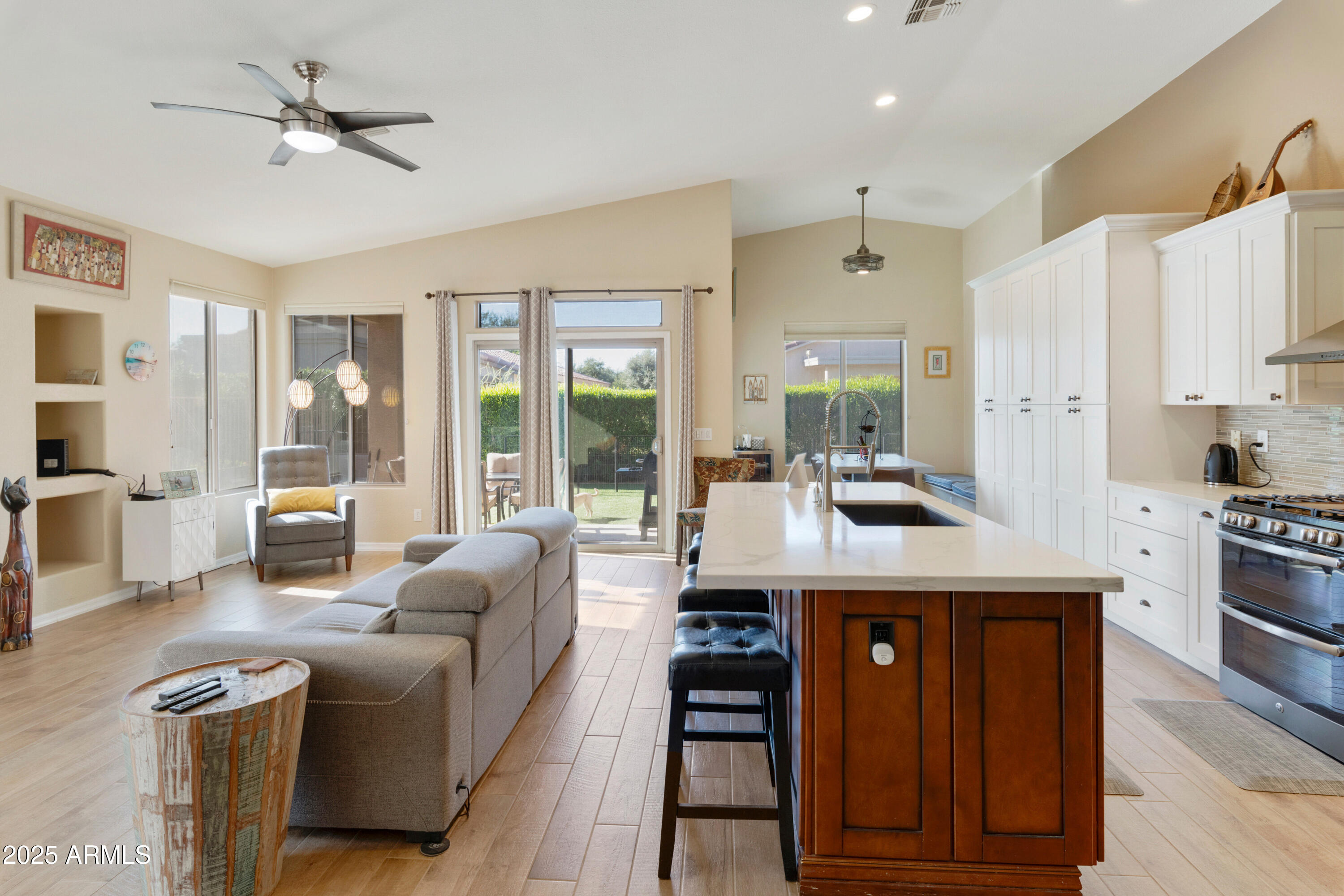 4727 East Azalea Drive Gilbert, AZ 85298 - Photo 5 of 46 a view of kitchen with stainless steel appliances granite countertop a stove and a refrigerator